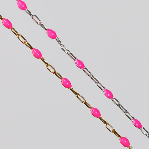Two chains with pink enamel on a gray background