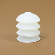 Seen is a stack of four of the protective bobbins that allow chain to be wrapped around them and stored effectively while still being easily accessible.