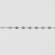 Silver chain on a light gray background