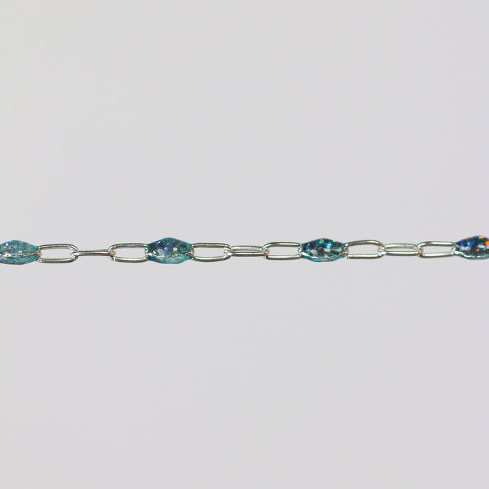 Wholesale silver chain Silvia in the opal enamel colorway on a light gray background showing the design and cable links.