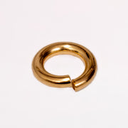 14K Yellow Gold metal jump ring, shown on a plain white background.