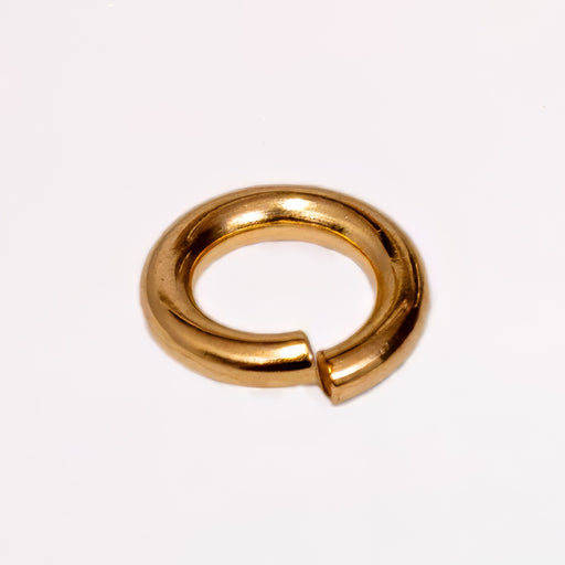 14K Yellow Gold metal jump ring, shown on a plain white background.