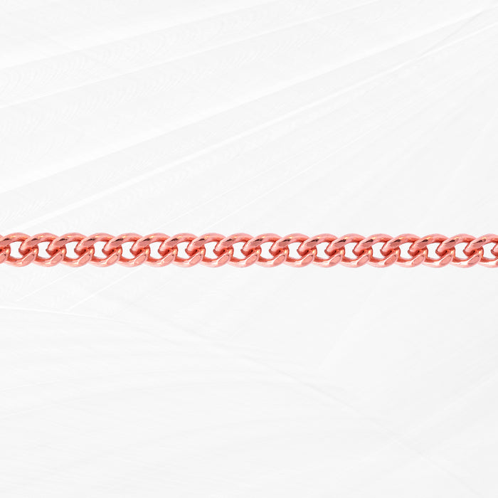 Rose gold chain on a white background