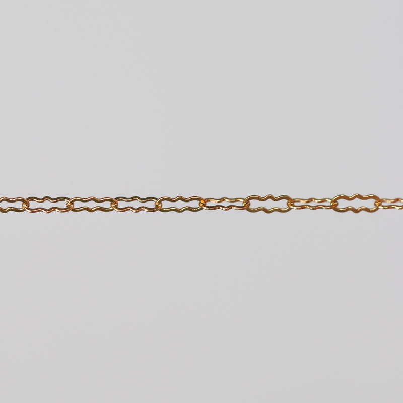Gold permanent jewelry chain with crinkled links