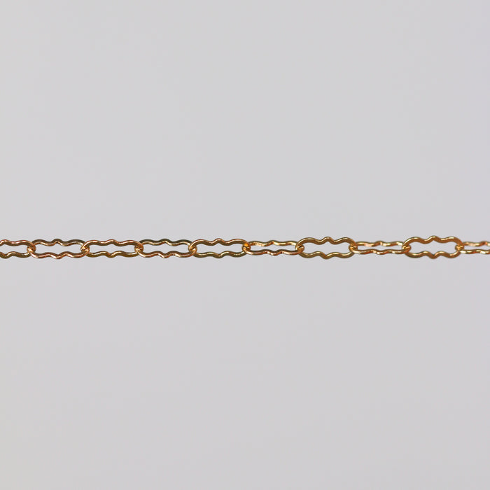 Gold permanent jewelry chain with crinkled links