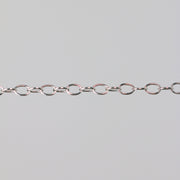 Practice chain stretched horizontally over a gray background