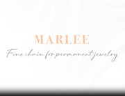 Marlee fine chain for permanent jewelry gets showcased as it twirls in this video